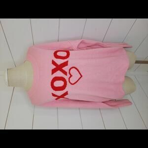 CECE small pink oversized XOXO heart sweater